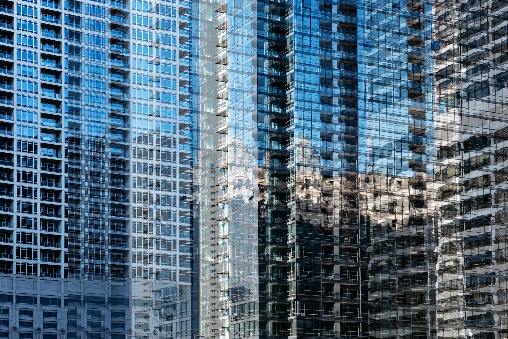Close-up of water sampling equipment and field instruments laid out on a rock beside a clear stream